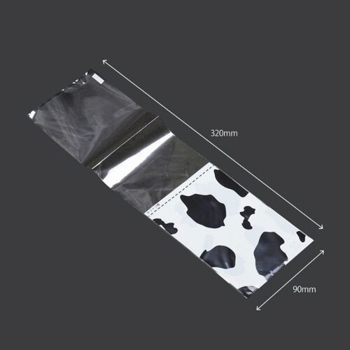 ミシン目付OP袋 モーモー柄(黒) 10袋